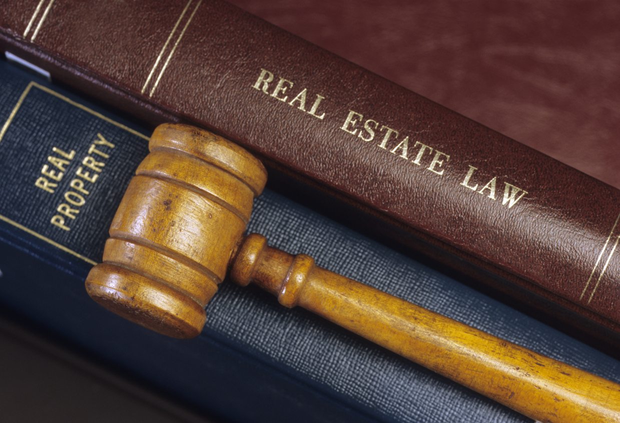 gavel on real estate books