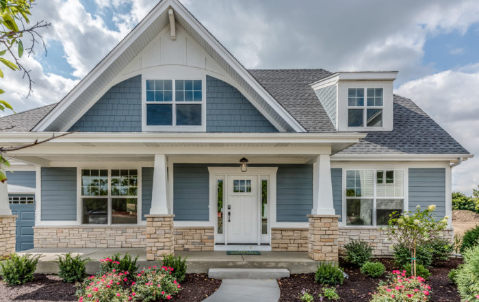 Front view of home with nicely landscaped front yard
